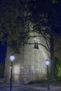Night view of an old Moorish tower illuminated on a cold December day in Alcala de Henares, Spain