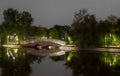 Night view of one of the illuminated bridges in Bordei Park in Bucharest Royalty Free Stock Photo