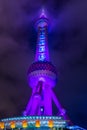 Night view of the The Oriental Pearl Tower at a cloudy day after raining with colorful  light in Pudong, Shanghai, China Royalty Free Stock Photo