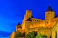 Night view over illuminated fortification of Carcassonne, France