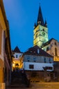 night view over illuminated lutheran cathedral of saint mary in romanian city sibiu...IMAGE Royalty Free Stock Photo