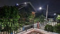 the night view over the terrace of the house which is lit by the lights Royalty Free Stock Photo