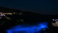 Night view over the thassos island of Greece, the pottery village of skala, with lights on the cliff, clear sky, stars in the sky Royalty Free Stock Photo