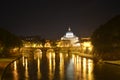 Night view over tiber river, saint peters basiica and ponte sant angelo in rome Royalty Free Stock Photo