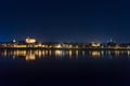 Night view of panoramic view on Old town of Torun city walls and reflection in Vistula river Royalty Free Stock Photo