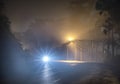 The night view of the pass road is full of fog with magical street lights