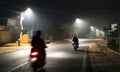 The night view of the pass road is full of fog with magical street lights