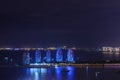 Night view of the Phoenix island in the Sanya city with bright multi-colored illumination buildings, structures and ships. Sanya Royalty Free Stock Photo