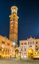 night view of the piazza die signori dominated by torre die lamberti in the italian city verona....IMAGE