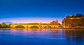 Night view of Pont d`Avignon over river Rhone, France
