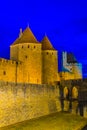 Night view of Porte Narbonnaise leading to the old town of Carcassonne, France