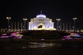 Night view of Presidential Palace gate and colorful fountains in Abu Dhabi, United Arab Emirates