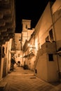 Night view of a quaint alley of a village of the South Italy. Royalty Free Stock Photo