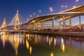 Night view reflection of Suspension bridge with highway intersection Royalty Free Stock Photo