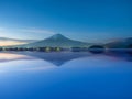 night view and reflection on water from mountain fuji at kawaguchiko lake japan Royalty Free Stock Photo