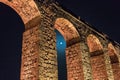 Night  view of the remains of an ancient Roman aqueduct located between Acre and Nahariya in Israel Royalty Free Stock Photo