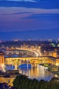 Night view of the River Arno and famous bridge Ponte Vecchio. Beautiful city night lights in Florence, Italy Royalty Free Stock Photo