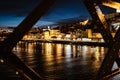 Night view of riverside in Porto with famous iron bridge in the front, Portugal Royalty Free Stock Photo