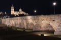 Night view of Salamanca cathedral and Roman bridge over Tormes river , Salamanca, Spain. Royalty Free Stock Photo