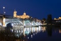 Night view of Salamanca Old and New Cathedrals from Enrique Esteban Bridge over Tormes River, Community of Castile and LeÃÂ³n, Royalty Free Stock Photo