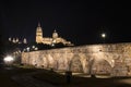 Night view of Salamanca Old and New Cathedrals from Roman Bridge over Tormes River, Community of Castile and LeÃÂ³n, Spain. Royalty Free Stock Photo