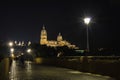 Night view of Salamanca Old and New Cathedrals from roman bridge over Tormes River at sunset, Community of Castile and LeÃÂ³n, Royalty Free Stock Photo