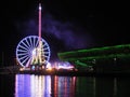 Night view of amuzement park rides at waterfront Royalty Free Stock Photo