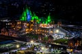 Night time green lighting on Shree Swaminarayan temple at night, Pune, India.