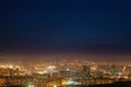 Winer smog over city at night