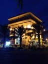 Night view of the Simpang Lima Gumul monument in Kediri, East Java, Indonesia, a replica of the Arc de Triomphe monument in France