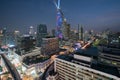 Night view with skyscraper in business district in Bangkok Thailand. Light show at Magnolias Ratchaprasong in Bangkok, Thailand. Royalty Free Stock Photo