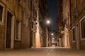 Night view of a small street in Venice, Italy. Architecture and sights of Venice. Nightlife in Venice. Venetian postcard Royalty Free Stock Photo