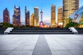 Night view of square pavement and city skyline in Shanghai Royalty Free Stock Photo