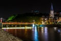 night view from St Georges footbridge in Lyon city with Fourviere cathedral Royalty Free Stock Photo