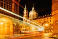 Night view of St. Nicolas Church, Prague, Czech republic. Long exposure city lights.Motion speed scene.Traffic trails in town.City Royalty Free Stock Photo