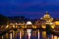 Night view of St. Peter`s Basilica and Ponte Sant`Angelo in Rome, Italy Royalty Free Stock Photo
