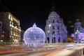 Night view of the street Grand Via and Metropolis hotel building in Madrid decorated for Christmas Royalty Free Stock Photo