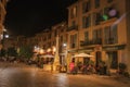 Night view of street with shops in Vence. Royalty Free Stock Photo