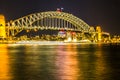 Night view of Sydney Harbor Bridge.