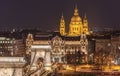 Night View of the Szechenyi Chain Bridge and church St. Stephen's in Budapest Royalty Free Stock Photo