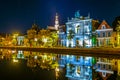 Night view of Teylers museum situated next to a channel in the dutch city Haarlem, Netherlands