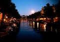 Night view to Amsterdam canal with moon, Netherlands Royalty Free Stock Photo