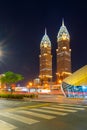 Night view to the beautiful illuminated skyscrapers Business Central Towers Dubai, UAE. Beautiful modern architecture. Royalty Free Stock Photo