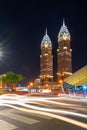 Night view to the beautiful illuminated skyscrapers Business Central Towers Dubai, UAE. Beautiful modern architecture. Royalty Free Stock Photo