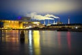Night view to Copenhagen Opera House Operaen and Amager Bakke factory smoke pipes in Copenhagen, Denmark. February 2020 Royalty Free Stock Photo
