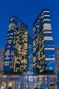 Night view to the entrance of the Rixos Premium Dubai JBR, shot at blue hour showing amazing modern skyscraper architecture. Royalty Free Stock Photo