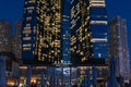 Night view to the entrance of the Rixos Premium Dubai JBR, shot at blue hour showing amazing modern skyscraper architecture. Royalty Free Stock Photo