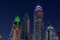 Night view to iconic skyscrapers skyline of Dubai Marina. Amazing illumination of the buildings. Royalty Free Stock Photo