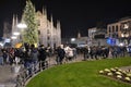 Night view to the New Year concert at the Duomo square with a lot of people present.