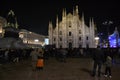 Night view to the New Year concert at the Duomo square with a lot of people present.